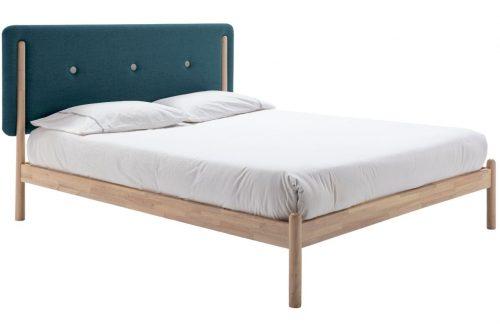 Dřevěná postel s tyrkysovým látkovým čelem Marckeric Annie 140 x 200 cm Marckeric